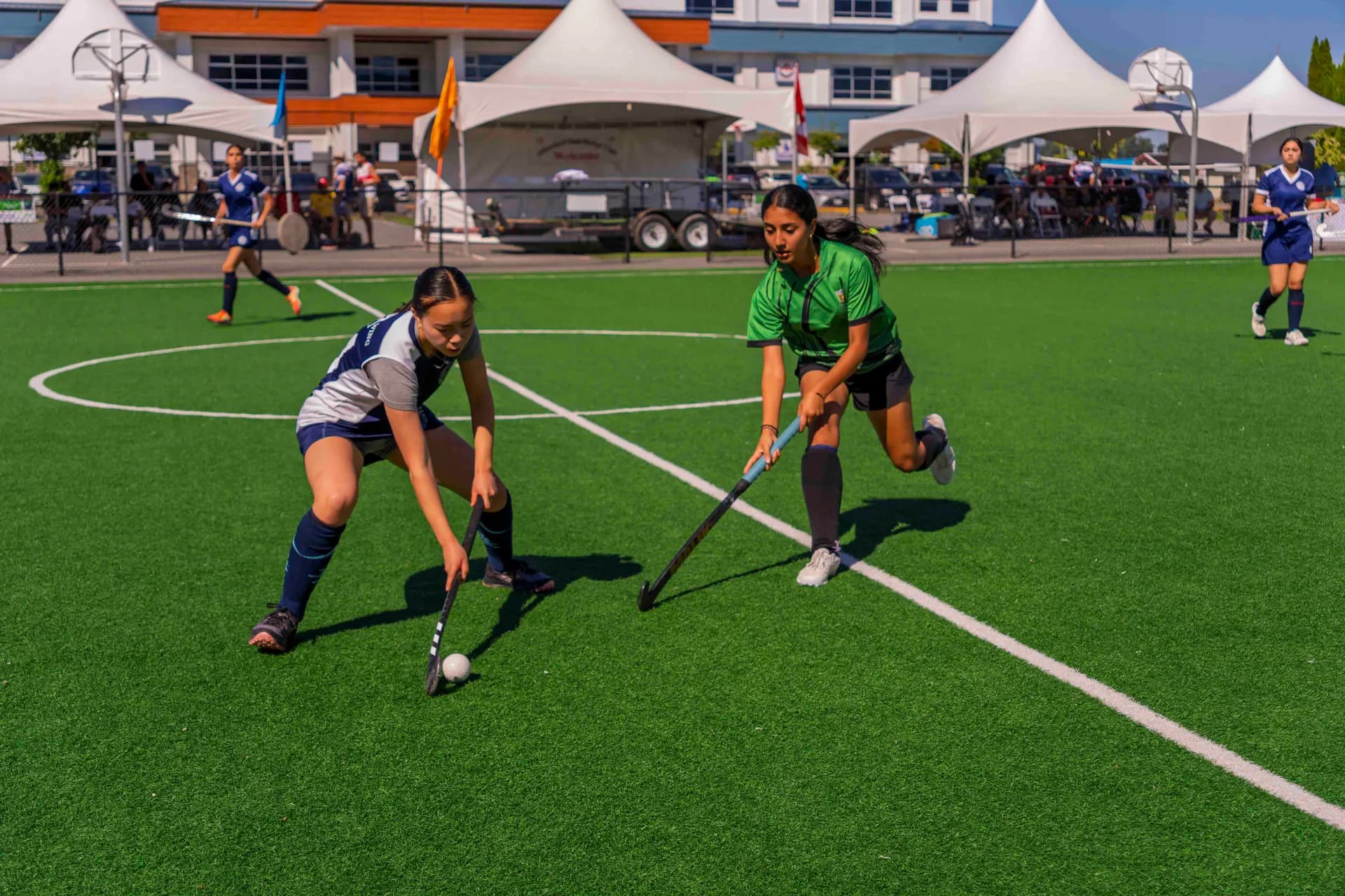AFHC youth players competing during a field hockey match in Abbotsford, BC