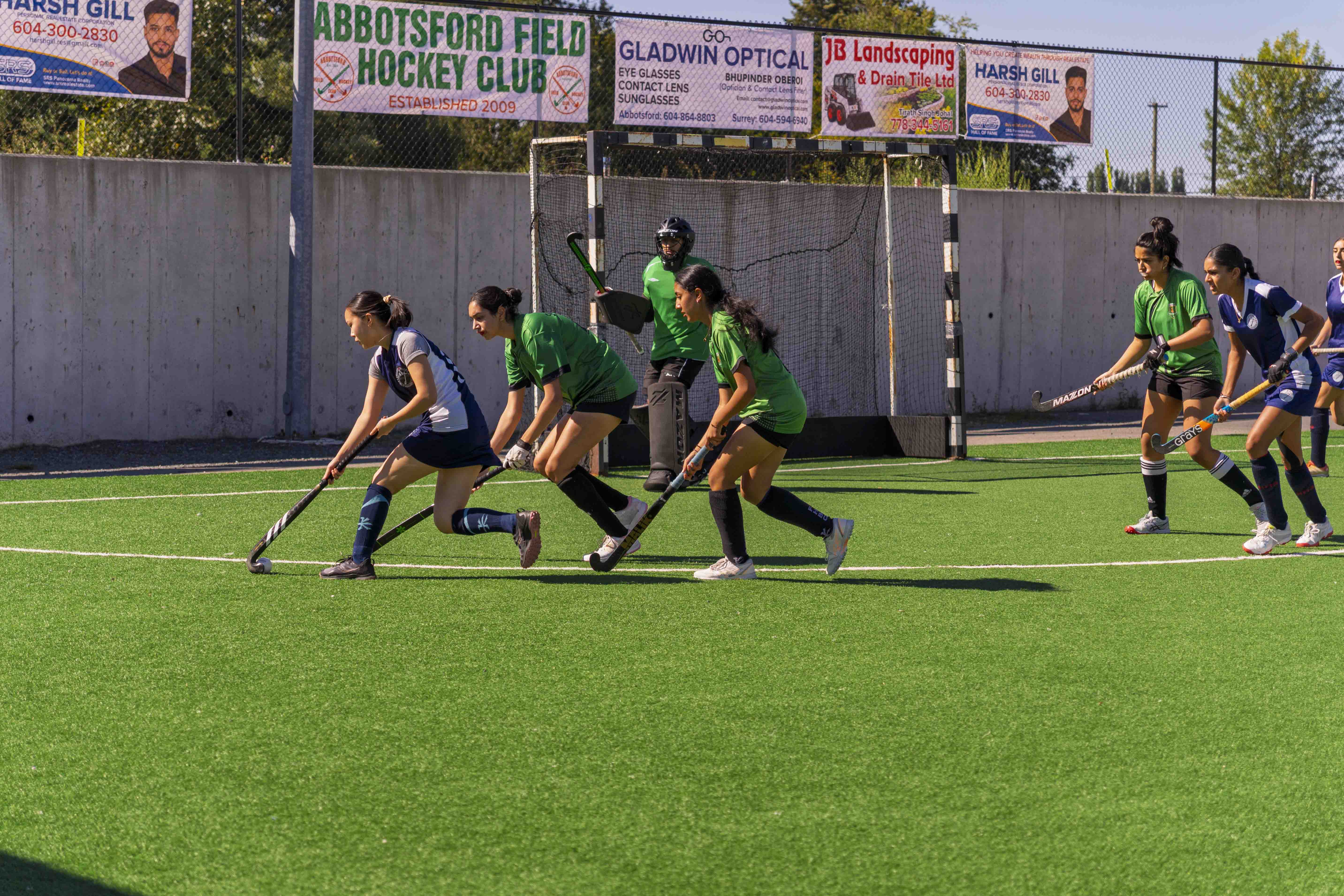 AFHC youth girls practising field hockey skills at the Dasmesh Punjabi School pitch