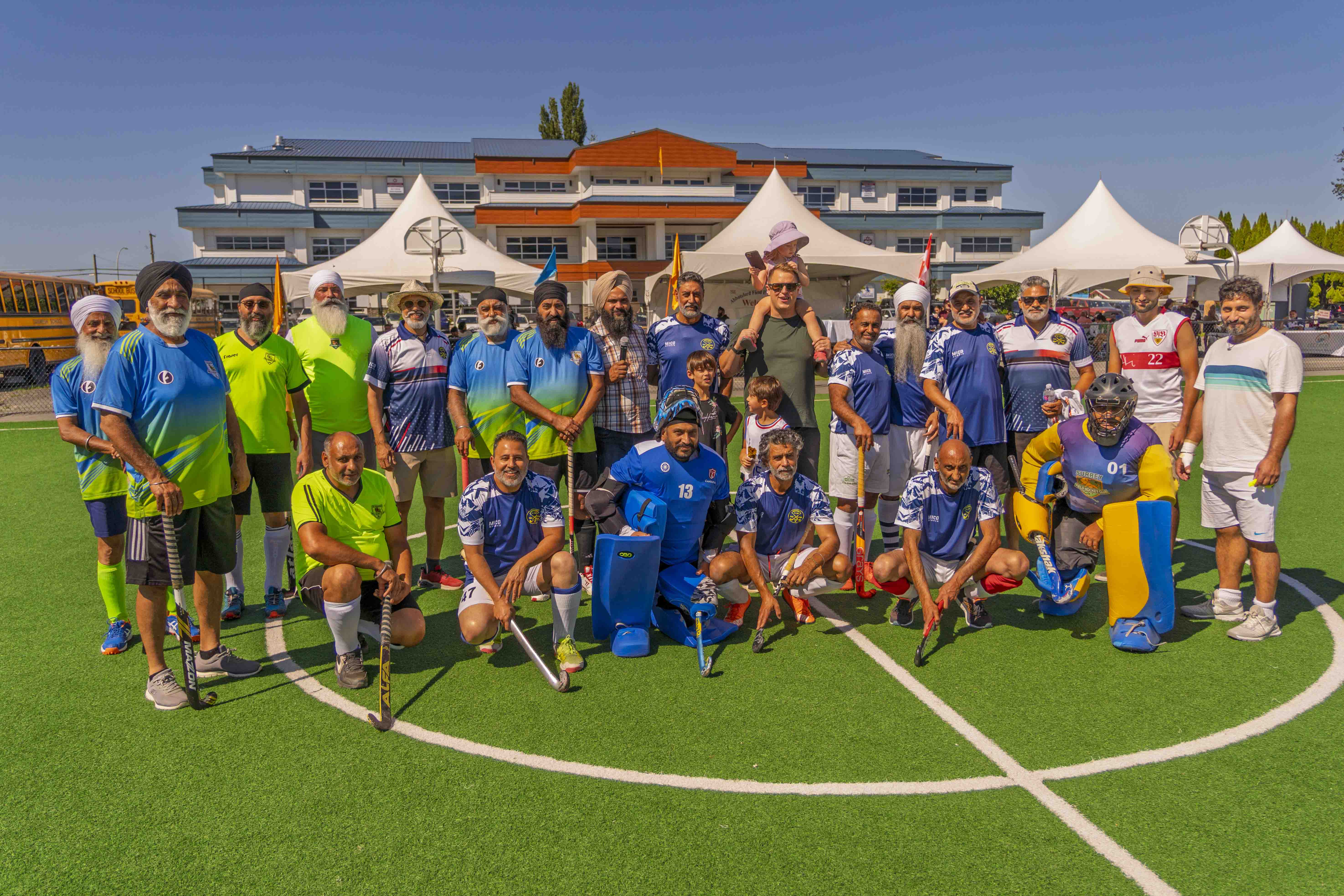 The Abbotsford Field Hockey Club community gathered together on the pitch